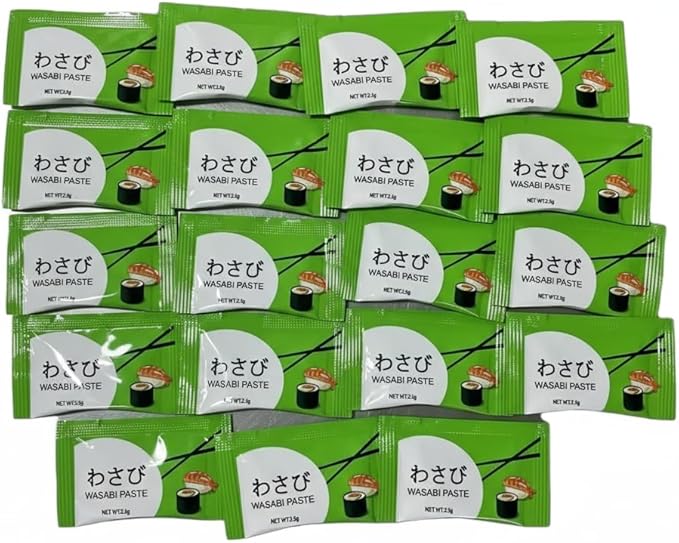 Multiple packages of wasabi paste with green and white packaging.